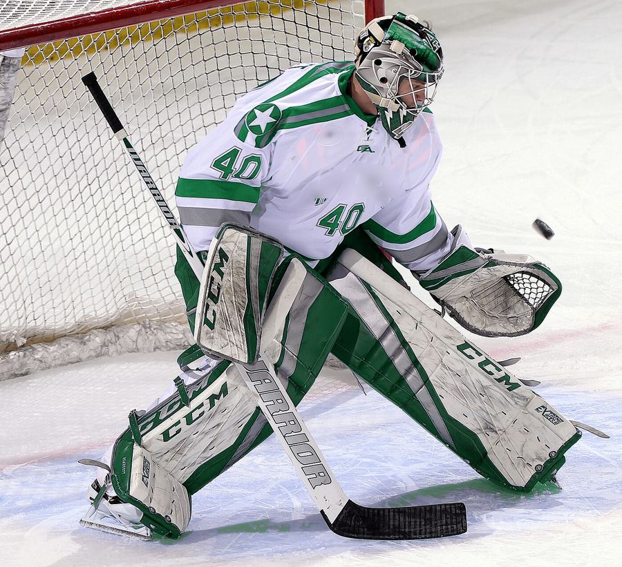 The Timberwolves goaltender tracks a shot