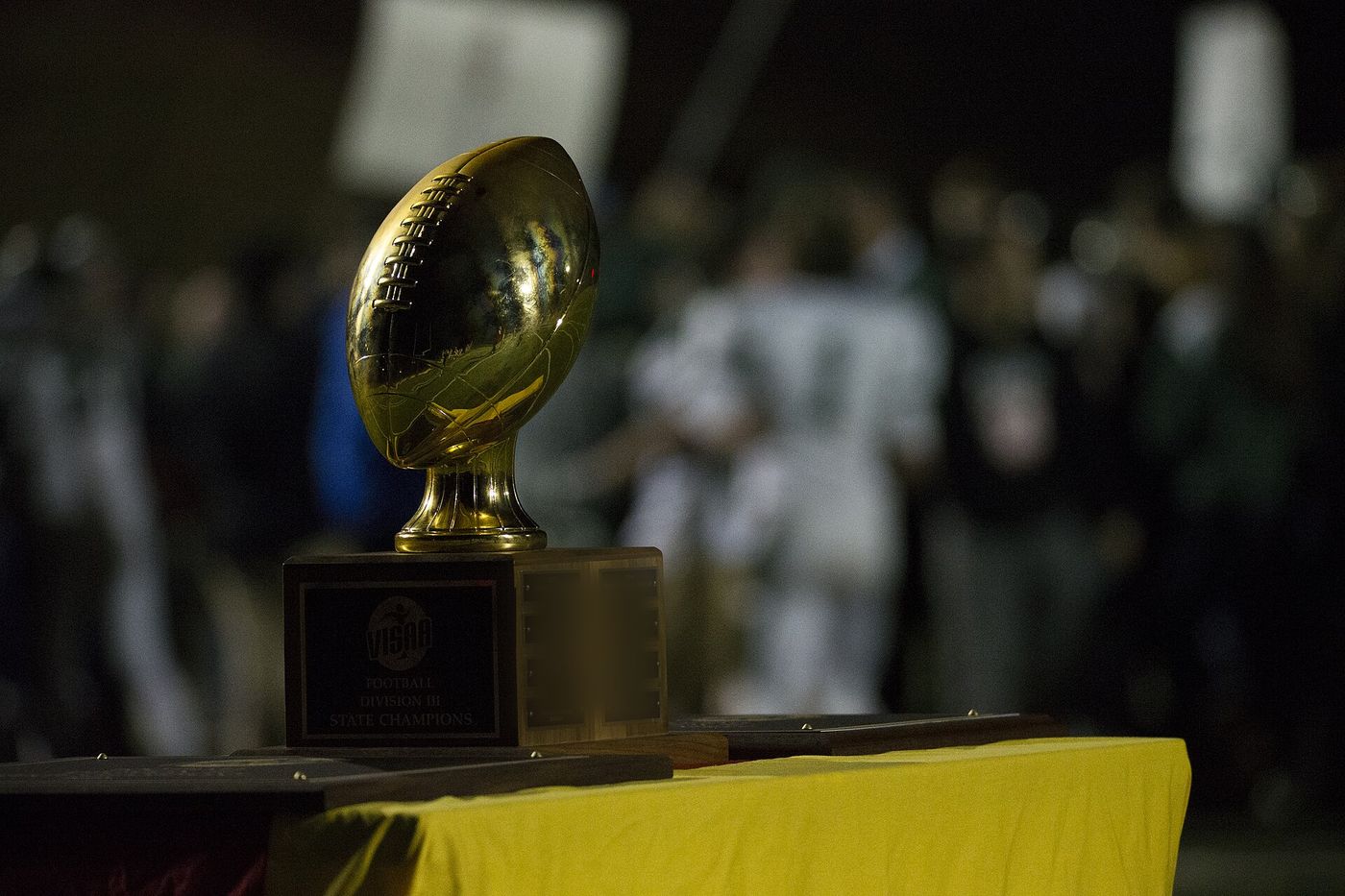 Championship trophy on the sideline table